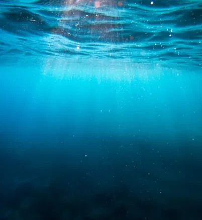 Counselling in Staffordshire, Cheshire, Derbyshire and Online - image of underneath the sea surface